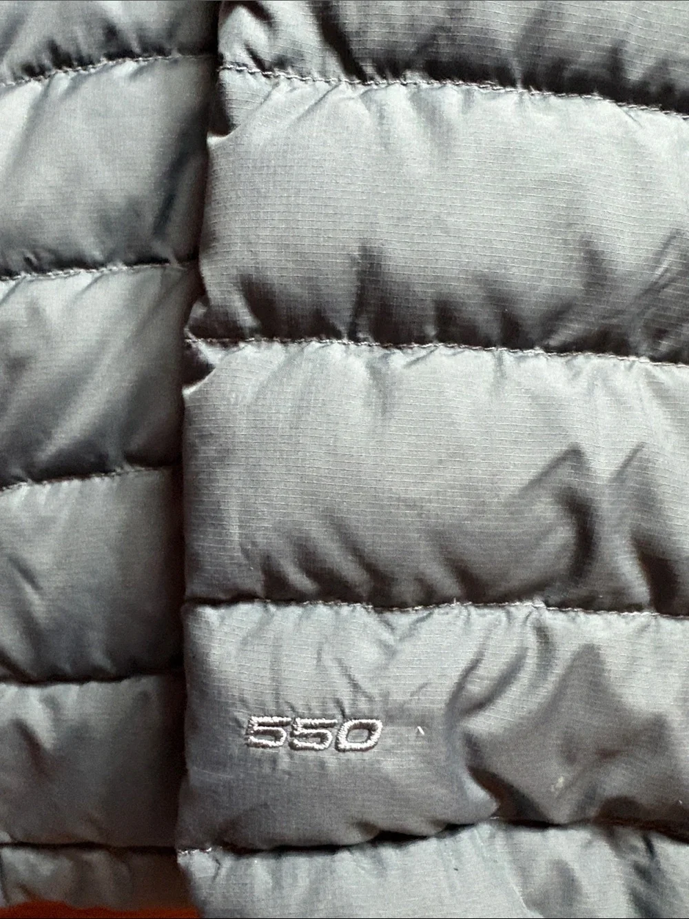The North Face 550 men’s medium gray Quilted Puffer Jacket